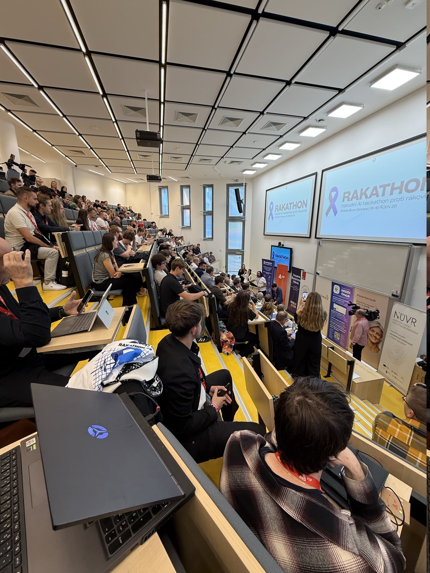 A full lecture hall during the Rakathon 2026 final pitches in Prague